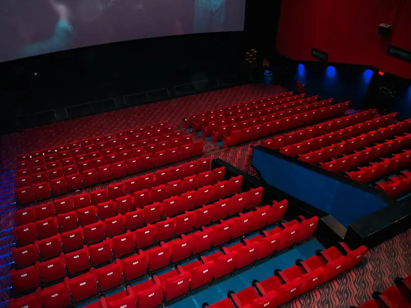 Auditorium seating with blue accent lighting